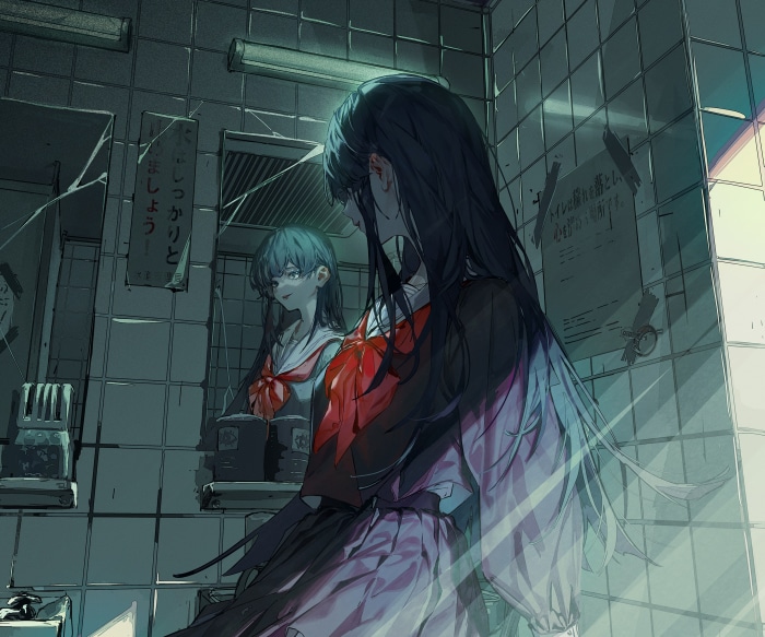 Girl in school uniform looking in a mirror