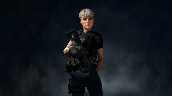 Woman with rifle in tactical gear
