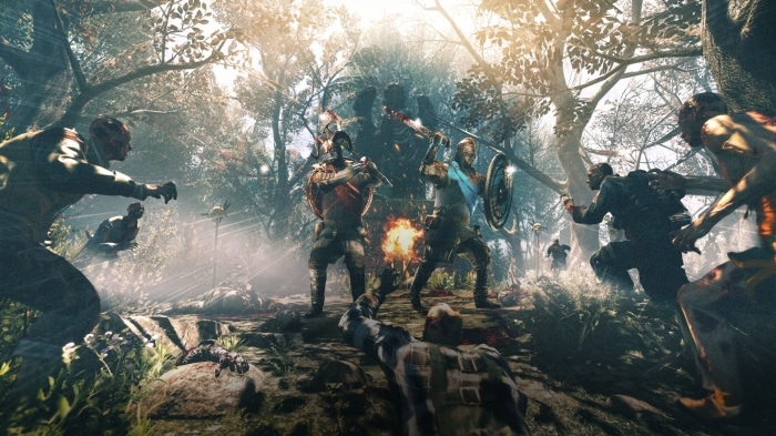 Warriors fighting zombies in a forest