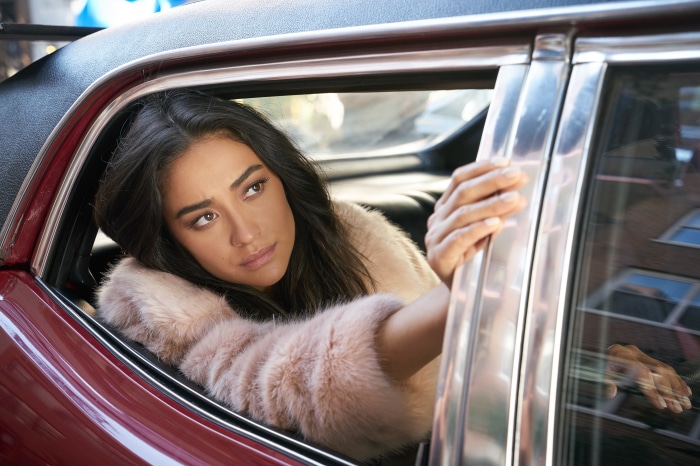 Woman in fur coat in car 4K