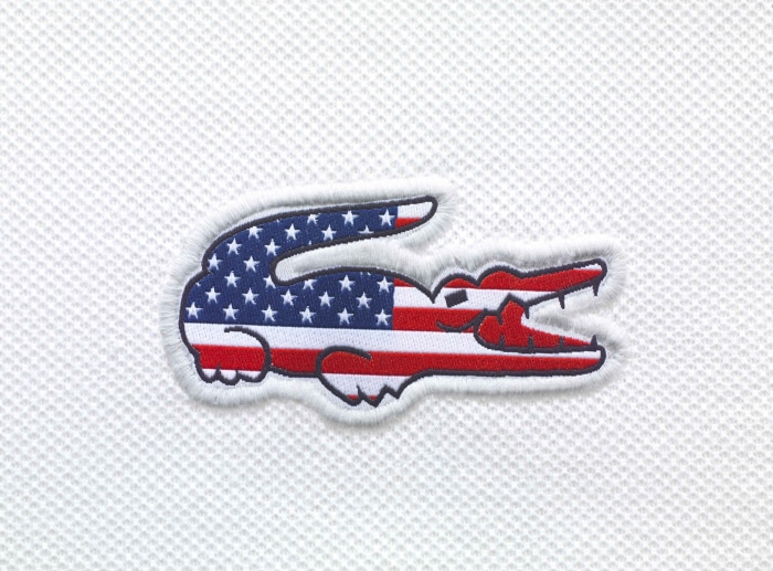 Lacoste crocodile logo with American flag design