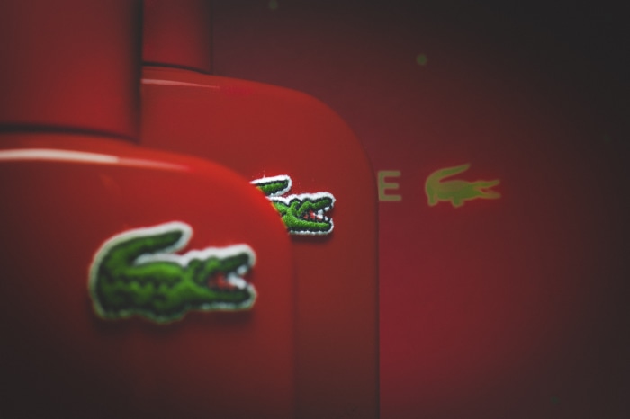 Lacoste Logo on Red Bottles