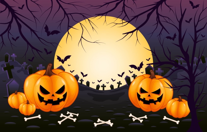 Halloween Jack-O-Lanterns in a Graveyard