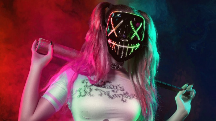 Harley Quinn with a mask and baseball bat