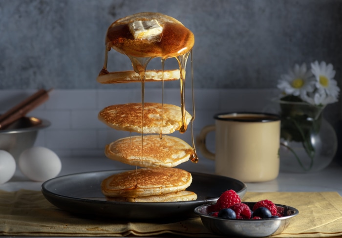 Stack of Pancakes with Syrup and Butter
