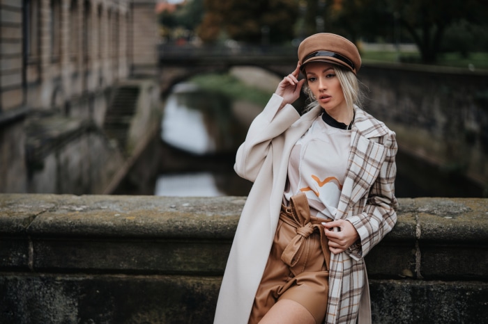 Woman wearing a hat and coat