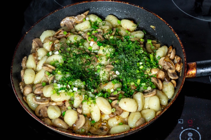 Gnocchi with Mushrooms and Herbs in a Pan
