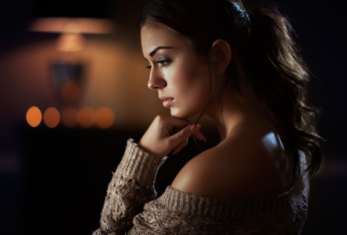 Woman in a sweater with blurred background