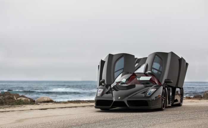 Ferrari Enzo Supercar with Doors Open by the Ocean