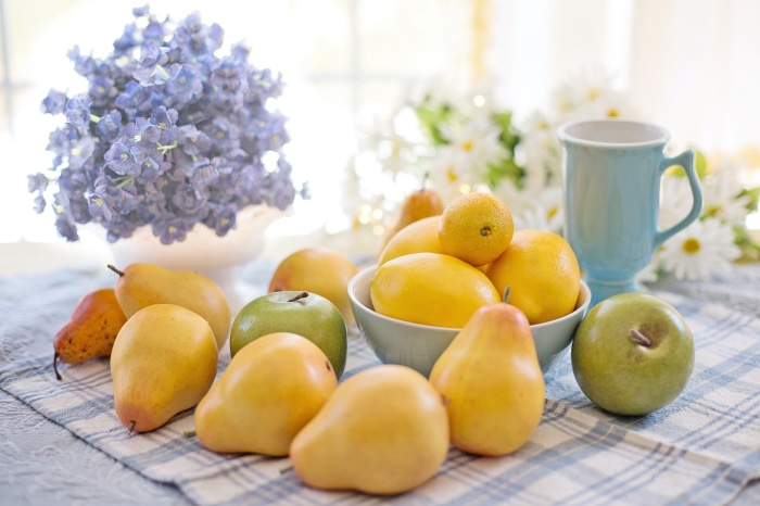 Still life with pears, apples, lemons, and flowers 4K