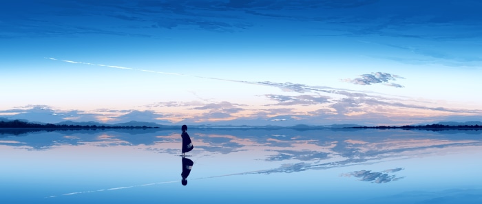 Girl standing in water with sky reflection
