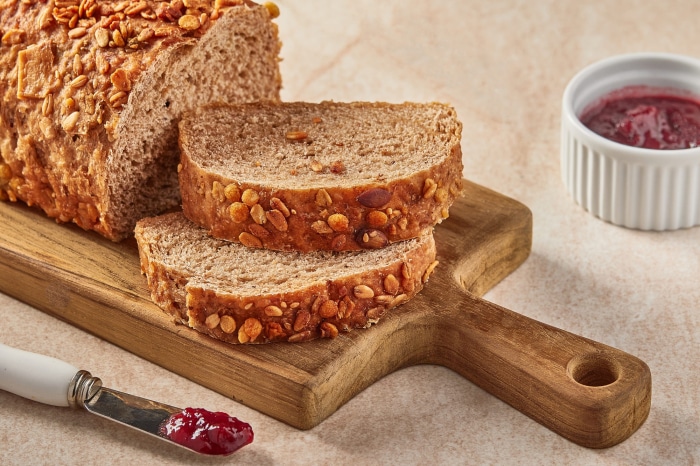Whole grain bread with seeds and jam