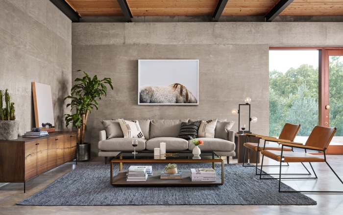 Living room with sofa, coffee table, and chairs