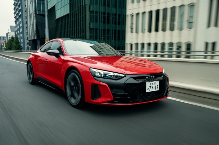 Red Audi RS E-Tron GT 4K driving on a city road