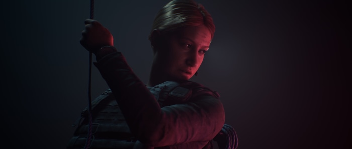 Woman holding a rope in House of Ashes