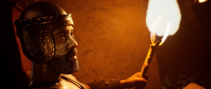 Man in helmet holding a torch in House of Ashes