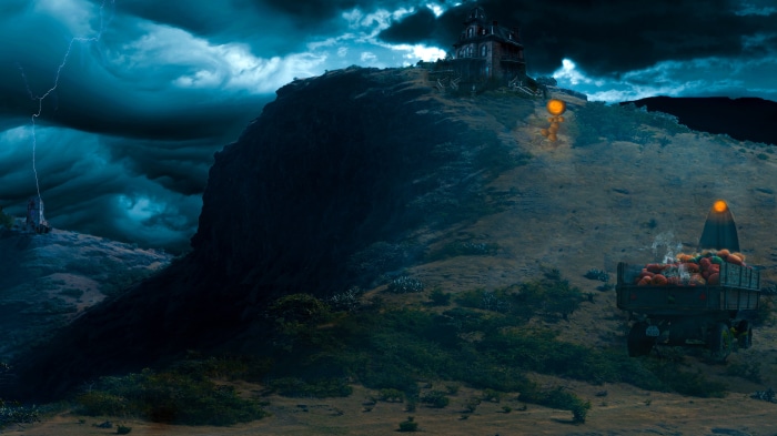 Haunted house on a hill with pumpkins and lightning