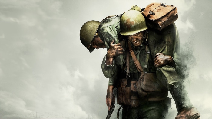 Soldier carrying another soldier on his back