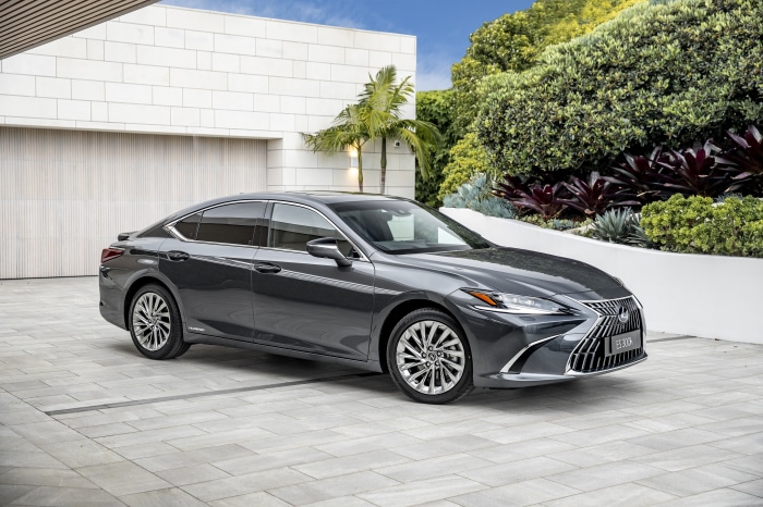 Lexus ES 300H parked in modern driveway