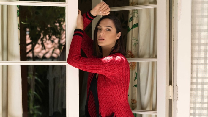 Gal Gadot in a red cardigan