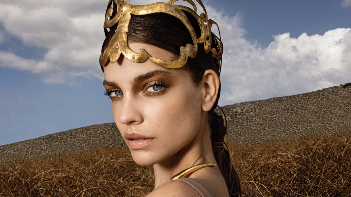 Barbara Palvin wearing a golden crown