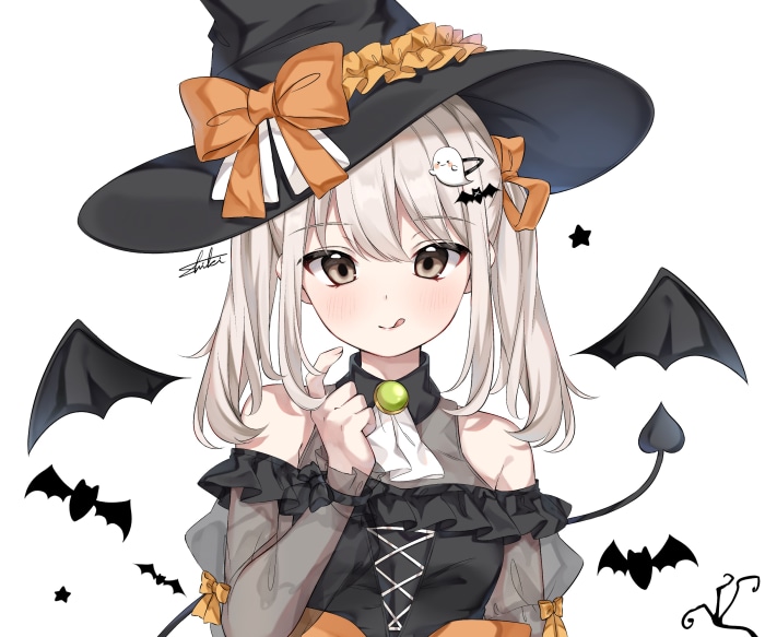 Girl in Witch Costume with Halloween Decorations