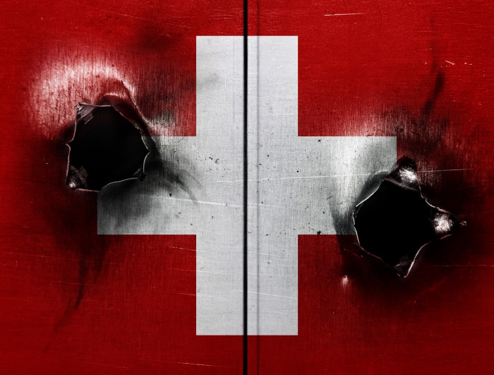 Swiss flag with bullet holes