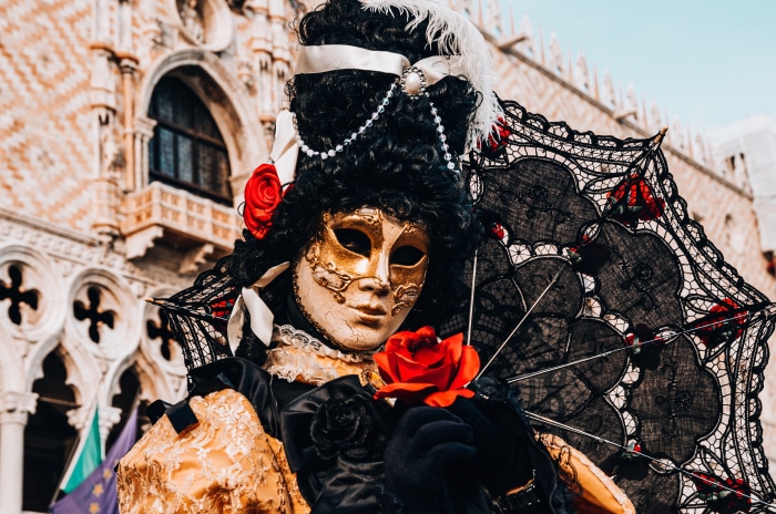 Venice Carnival Masked Person with Rose and Umbrella