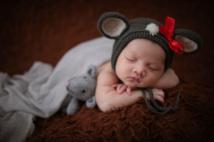 Baby Sleeping with Mouse Hat and Toy