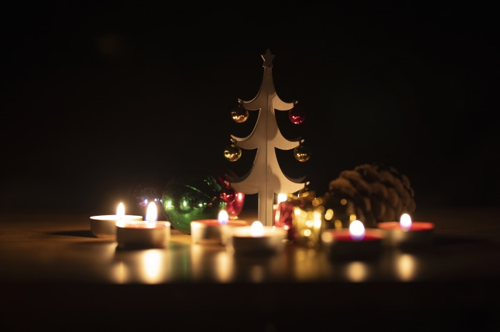Christmas tree with ornaments and candles