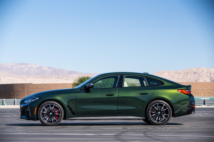 Green BMW M440i Gran Coupe parked outdoors