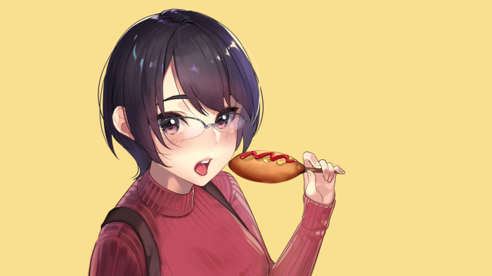 Girl with glasses eating a corn dog
