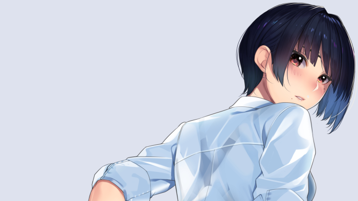 Girl in a white shirt looking over her shoulder