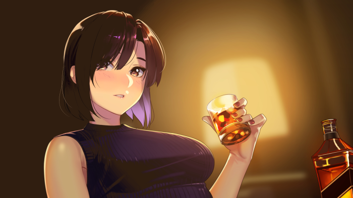 Girl holding a glass of whiskey