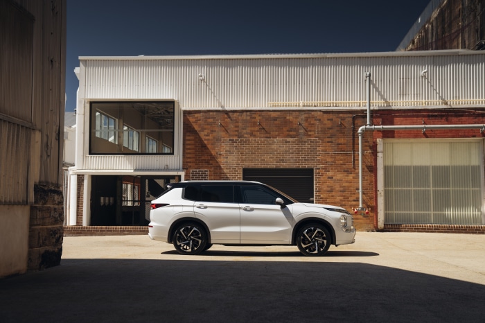 White Mitsubishi Outlander SUV parked outdoors