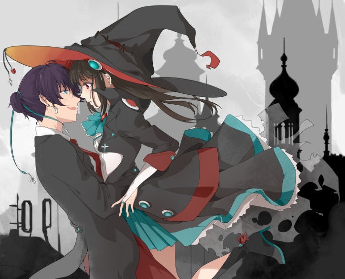 Couple in Witch Hats with Castle Background