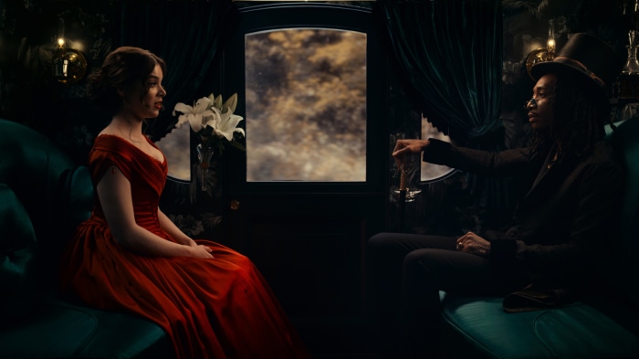 Hailee Steinfeld and Wiz Khalifa in a carriage