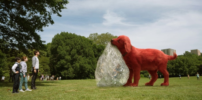 Clifford The Big Red Dog with children in a park