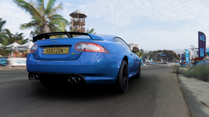 Blue Jaguar F-Type R driving in Forza Horizon 5
