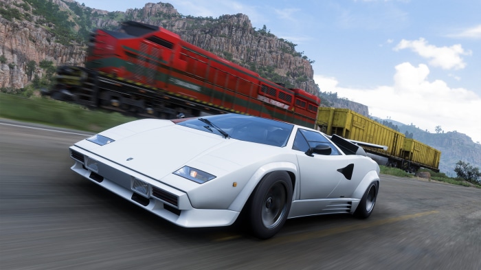 White Lamborghini Countach and train in Forza Horizon 5