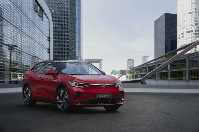 Red Volkswagen ID.5 GTX in modern city