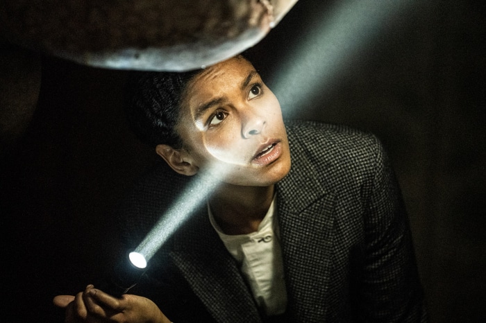 Thalissa Teixeira with a flashlight