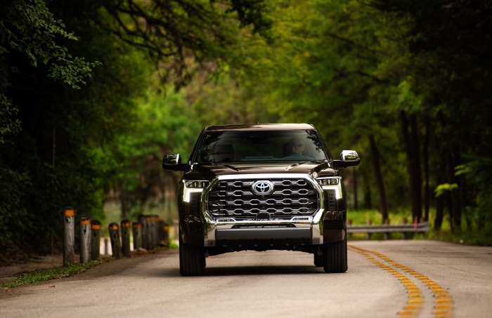 Toyota Tundra CrewMax 1794 Edition driving on a road