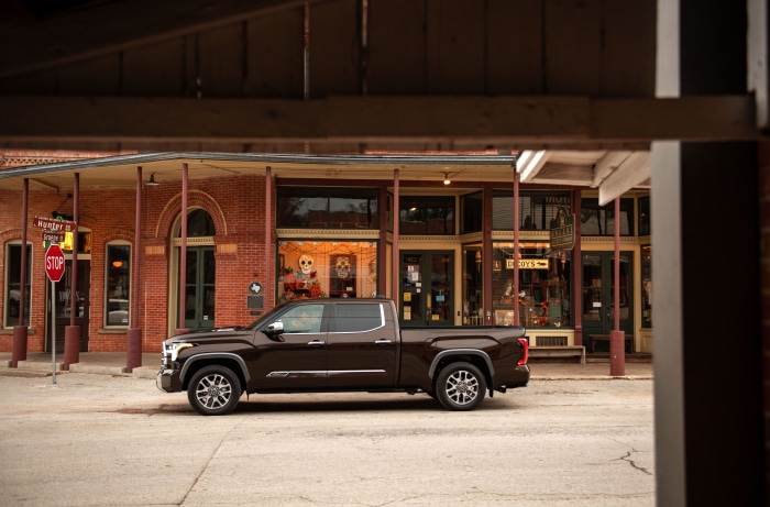 Brown Toyota Tundra CrewMax 1794 Edition parked