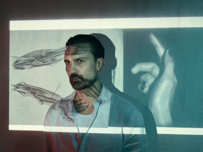 Henry Lloyd-Hughes projected onto anatomical drawings