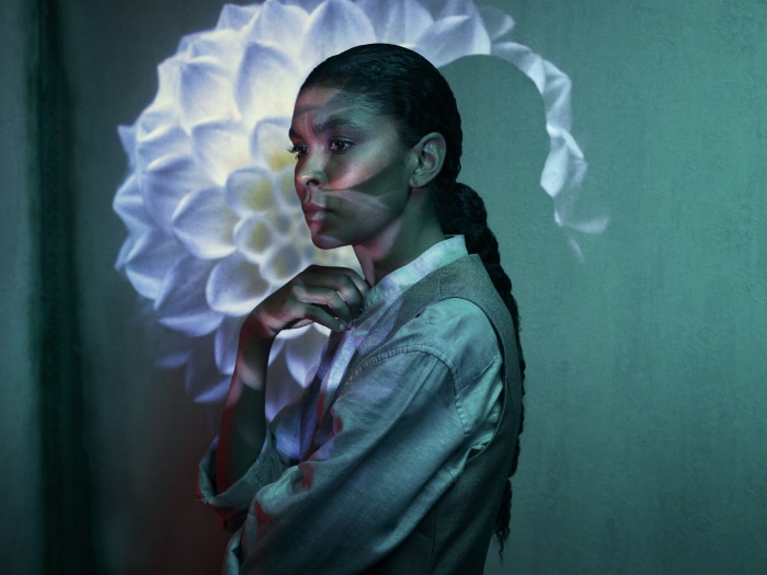 Thalissa Teixeira with projected flower