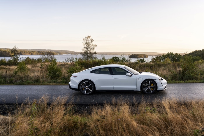 White Porsche Taycan Turbo S on a road