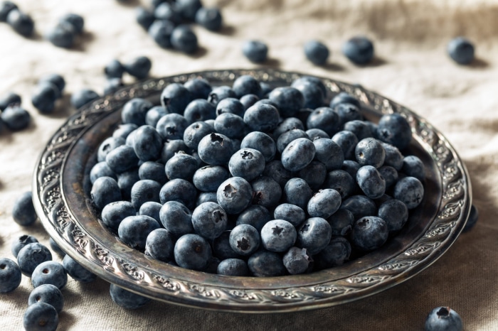 Blueberries in a decorative metal bowl
