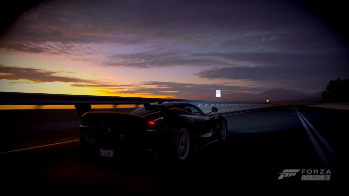 Black supercar driving on a highway at sunset in Forza Horizon 3