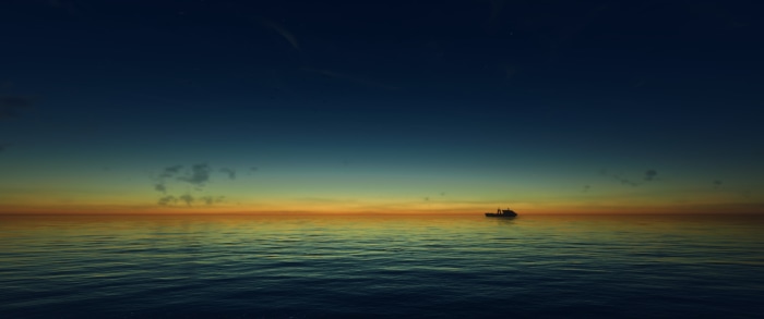 Boat on the ocean at sunset
